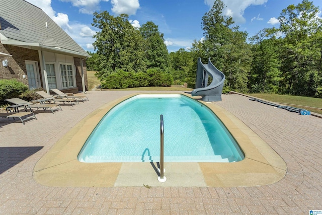 171 Sheeps Xing, Calera, AL 35040 - pool with a water slide and a patio