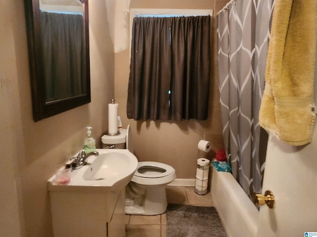 full bathroom with tile patterned flooring, toilet, vanity, and shower / bath combo