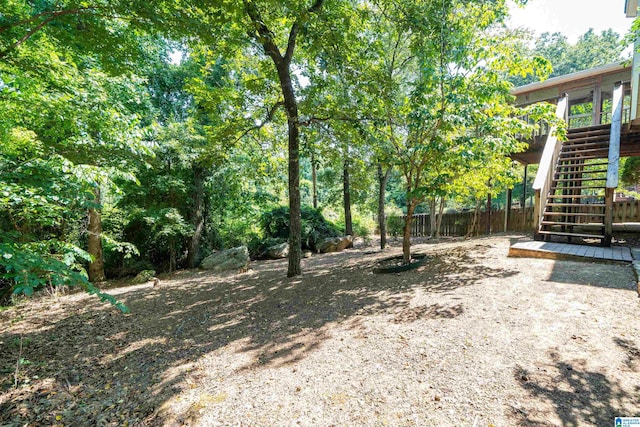 view of yard with a wooden deck