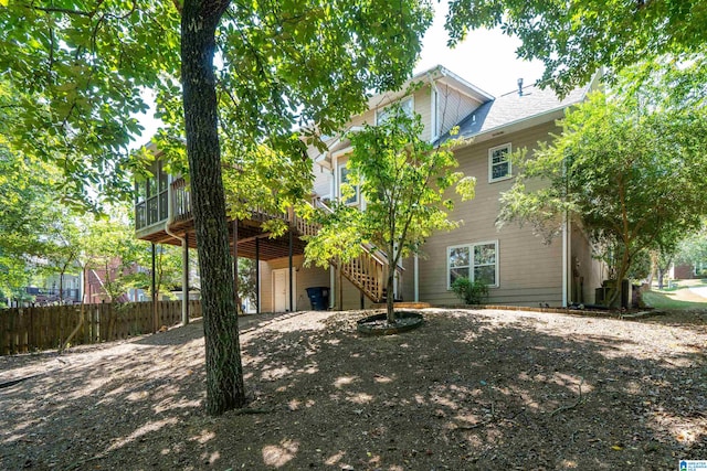 view of front of property featuring a wooden deck