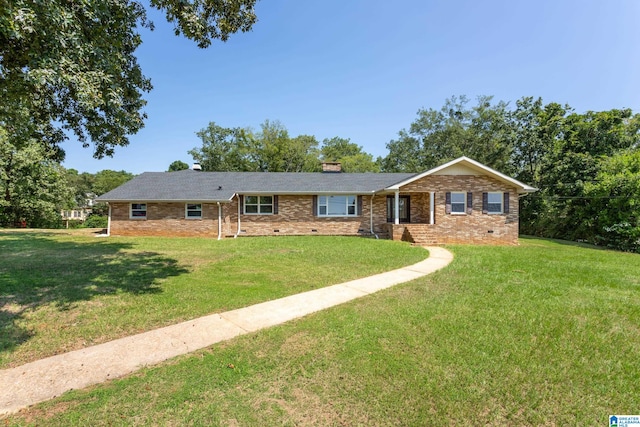 ranch-style home featuring a front lawn