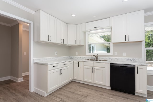 kitchen featuring light hardwood / wood-style floors, white cabinets, sink, and dishwasher