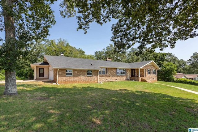 ranch-style house featuring a front lawn