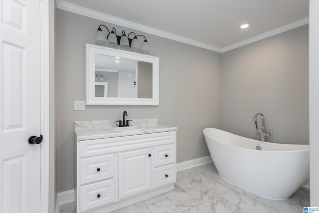 bathroom featuring a bathtub, tile patterned floors, ornamental molding, and vanity