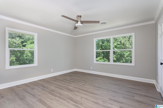 7 Christopher Way, Anniston, AL 36207 - spare room with crown molding, wood finished floors, a ceiling fan, and baseboards