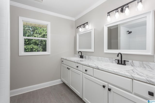 bathroom with crown molding, walk in shower, and vanity