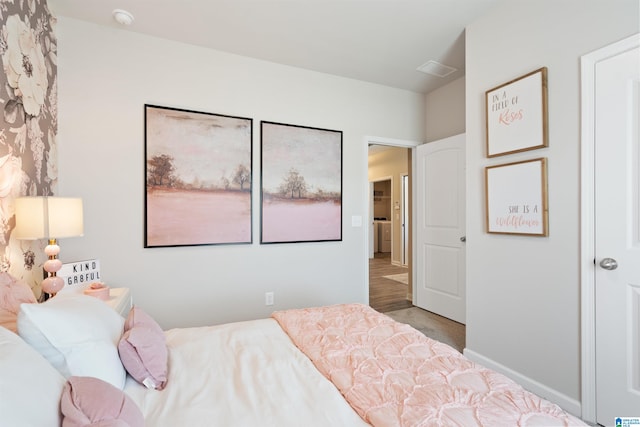 bedroom featuring wood-type flooring