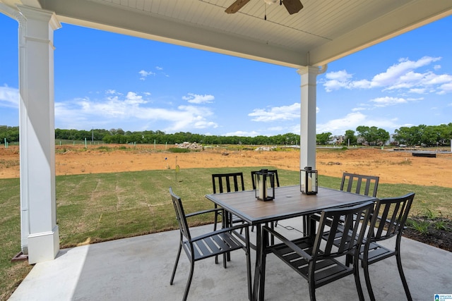 view of patio featuring ceiling fan