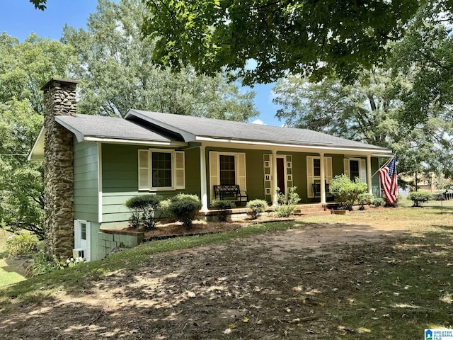 ranch-style home featuring covered porch