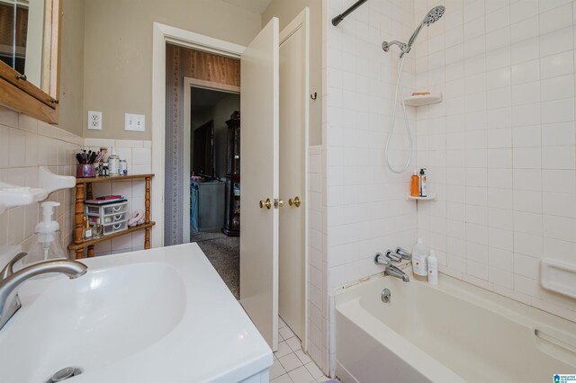 bathroom featuring tile walls, plenty of natural light, and toilet