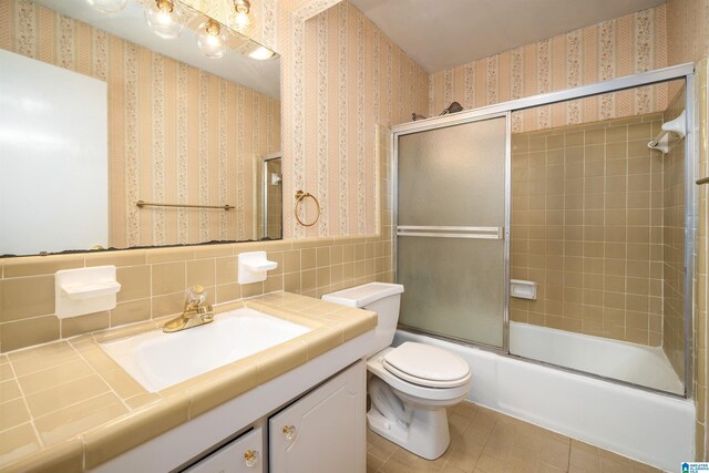 spare room featuring hardwood / wood-style flooring and ceiling fan