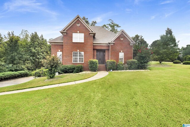 view of front of property with a front lawn