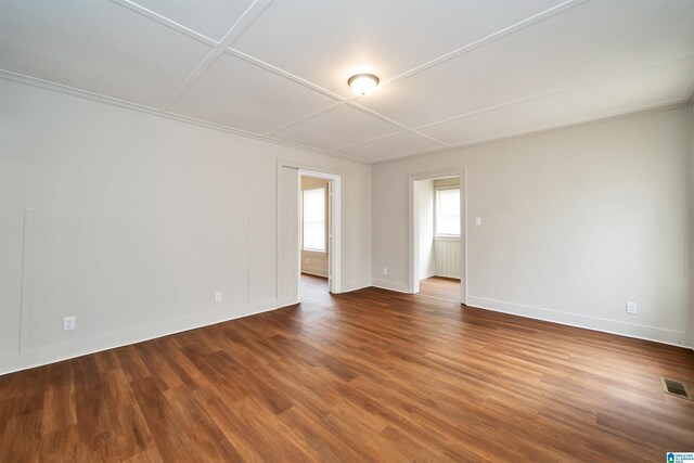 spare room featuring hardwood / wood-style floors