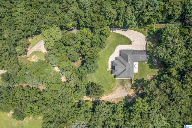 bird's eye view featuring a forest view