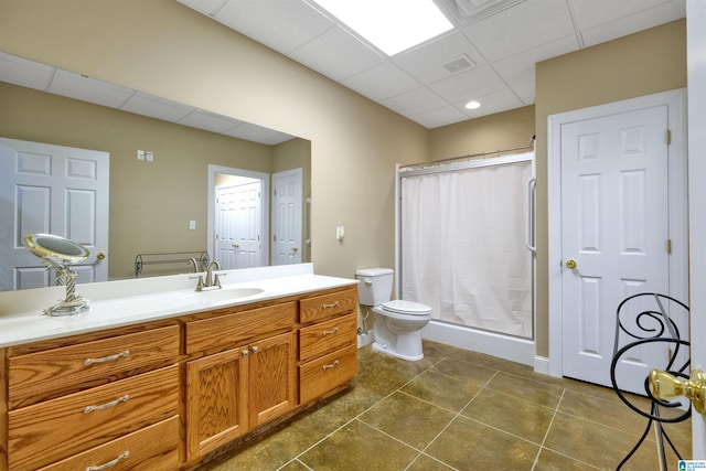 bathroom featuring a paneled ceiling, toilet, a shower with shower curtain, visible vents, and vanity