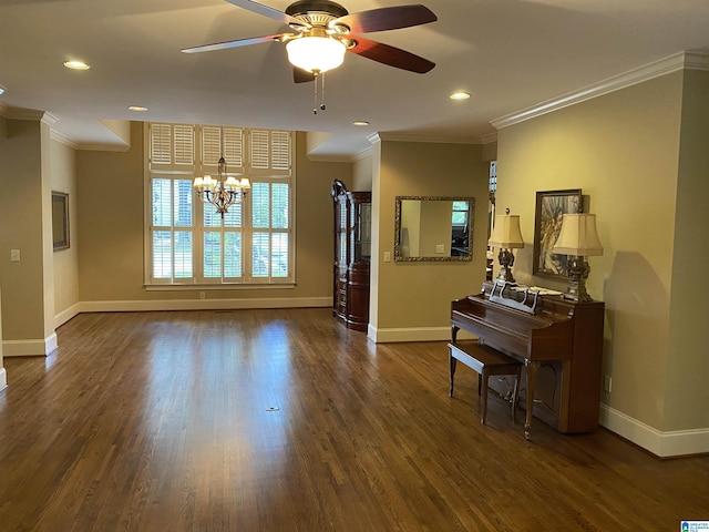 interior space with baseboards, crown molding, and wood finished floors