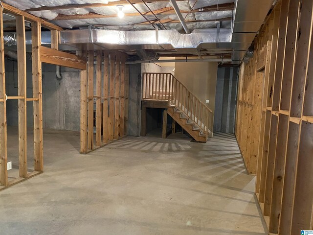 unfinished basement with stairway