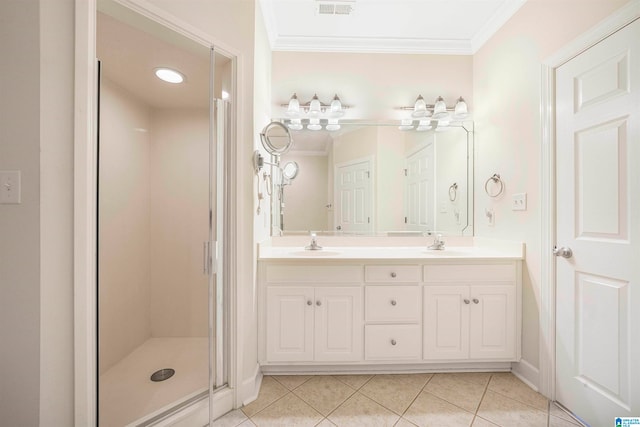 bathroom featuring ornamental molding, vanity, walk in shower, and tile patterned floors