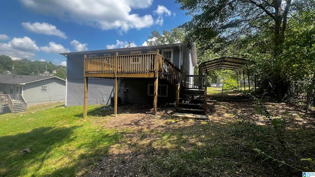 back of property featuring a deck and a yard