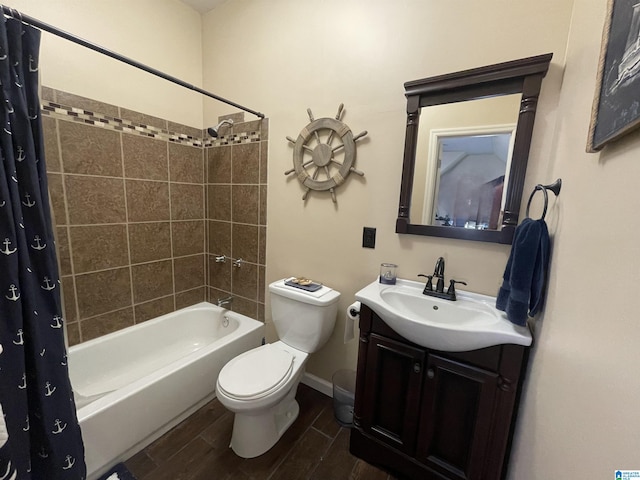 full bathroom featuring wood-type flooring, toilet, shower / tub combo with curtain, and vanity