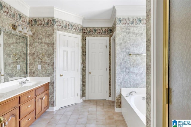 bathroom featuring crown molding, a bathtub, and vanity