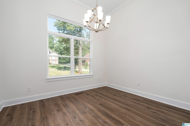 unfurnished room with dark hardwood / wood-style flooring, an inviting chandelier, and lofted ceiling