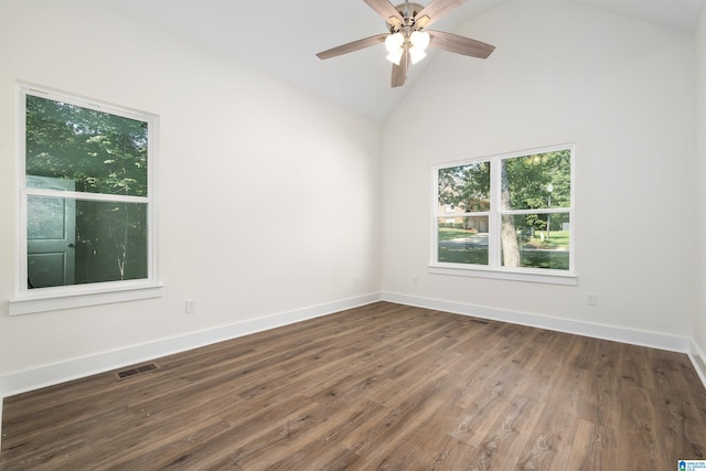 spare room featuring ceiling fan, high vaulted ceiling, and dark hardwood / wood-style floors