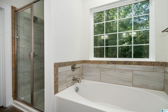 bathroom with independent shower and bath