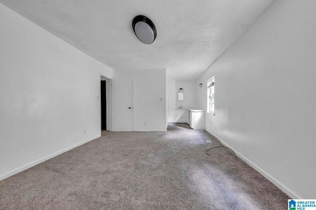 interior space featuring a textured ceiling