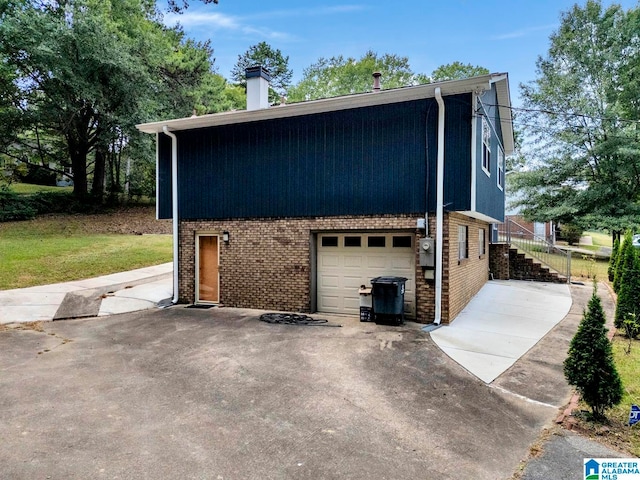 view of property exterior with a garage