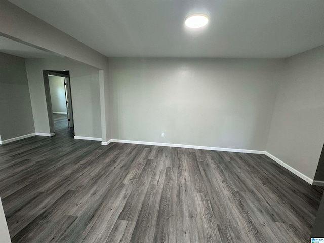 spare room with hardwood / wood-style floors