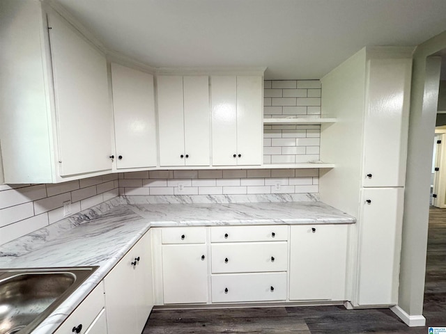 kitchen with dark wood-style floors, open shelves, white cabinets, and tasteful backsplash