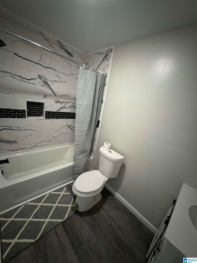 full bathroom with vanity, toilet, hardwood / wood-style floors, and shower / bathtub combination with curtain