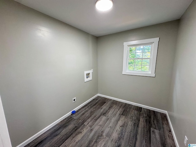 unfurnished room featuring dark wood-type flooring