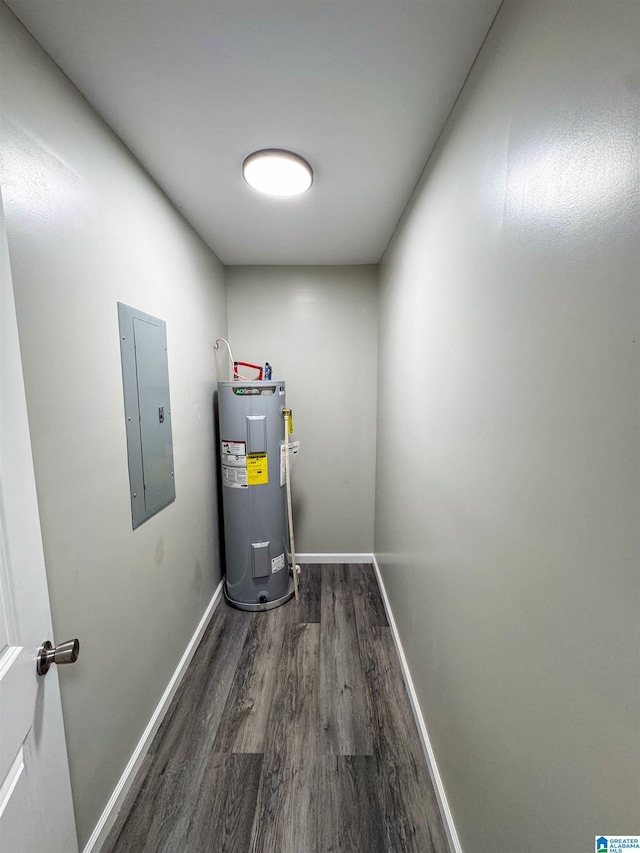 utility room featuring water heater and electric panel