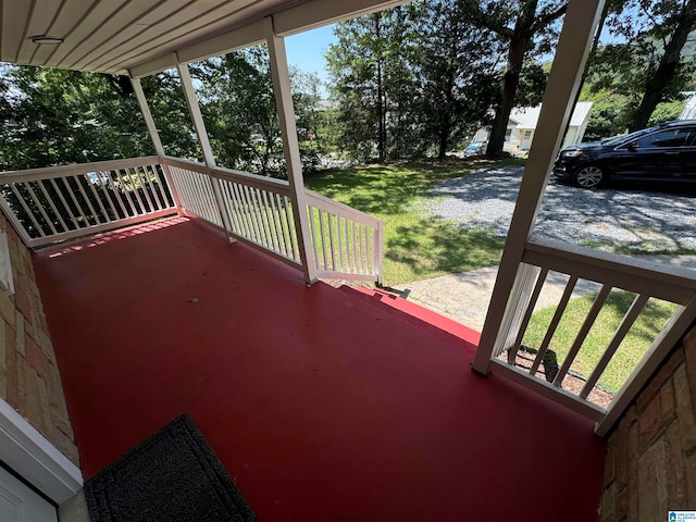 deck featuring a lawn