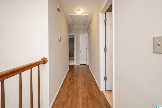 corridor featuring light hardwood / wood-style floors