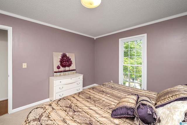 carpeted bedroom with crown molding and a textured ceiling