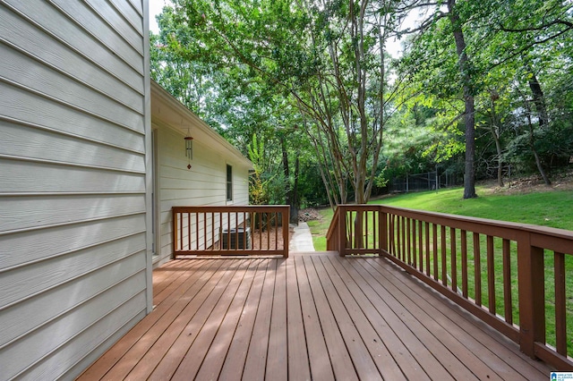 wooden deck with a yard