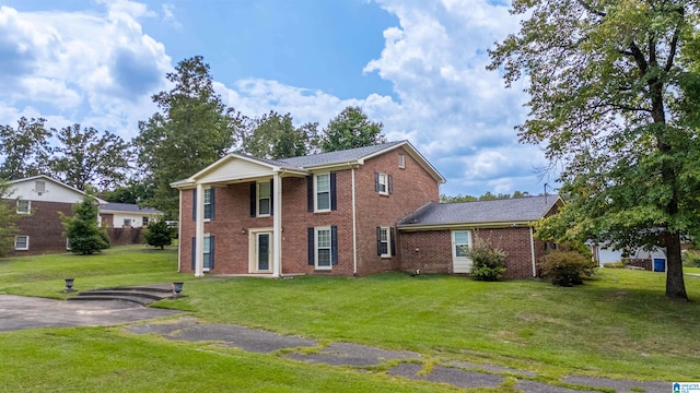 view of front of house with a front lawn