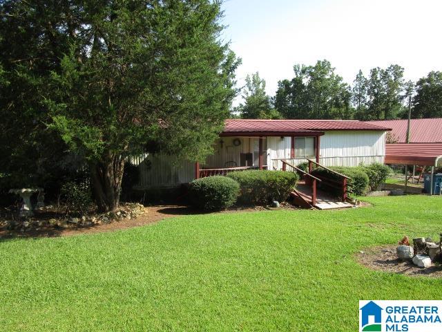 exterior space with a front lawn