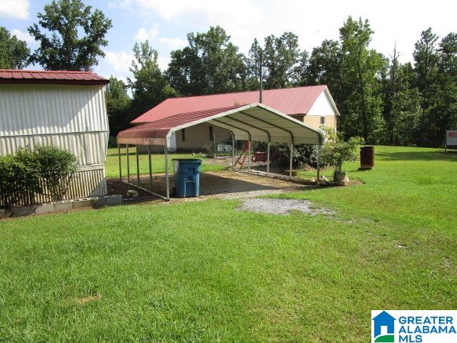 exterior space featuring a carport