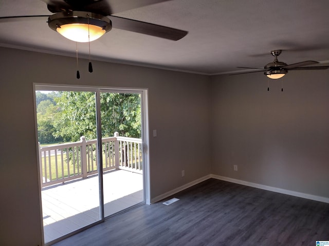 empty room with ceiling fan, ornamental molding, and hardwood / wood-style flooring