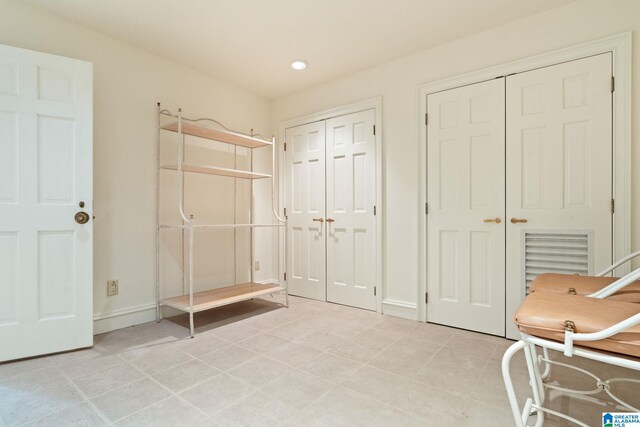 interior space featuring light tile patterned floors