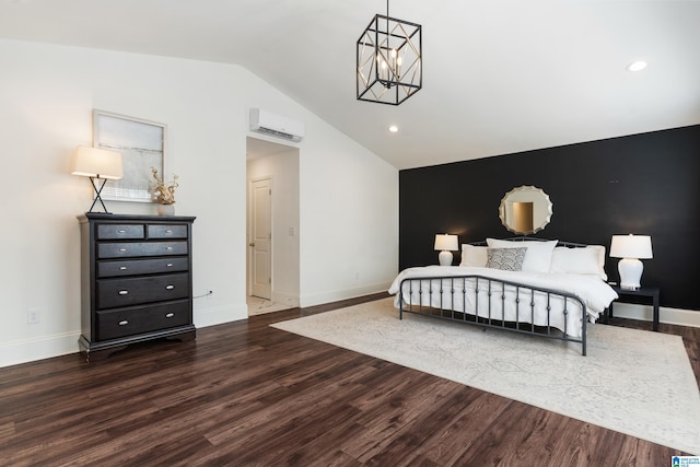 bedroom with a wall mounted AC, vaulted ceiling, a notable chandelier, and hardwood / wood-style flooring