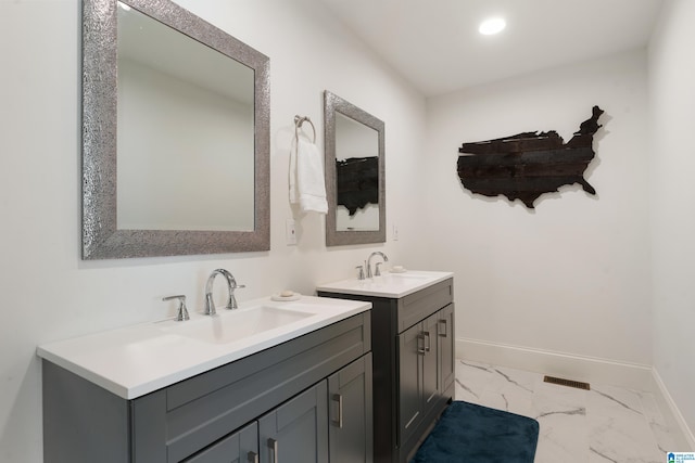 bathroom featuring tile patterned floors and vanity