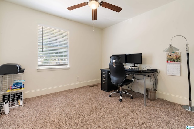 carpeted office with ceiling fan