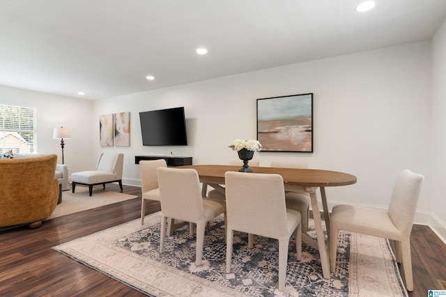 dining room featuring dark hardwood / wood-style flooring