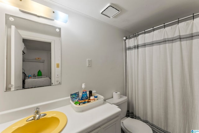 bathroom featuring a shower with shower curtain, toilet, and vanity