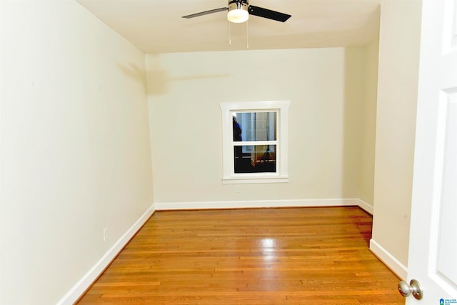 unfurnished room featuring light hardwood / wood-style floors and ceiling fan